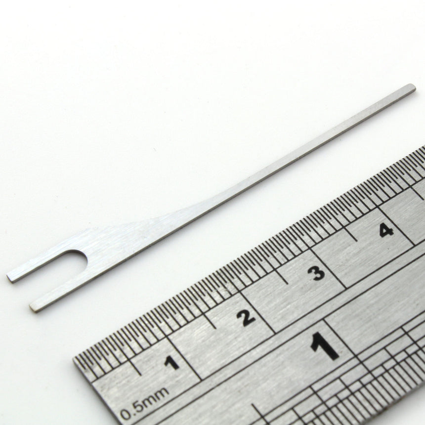 Dangerfield Universal Lock Pick Gun Needles - against ruler